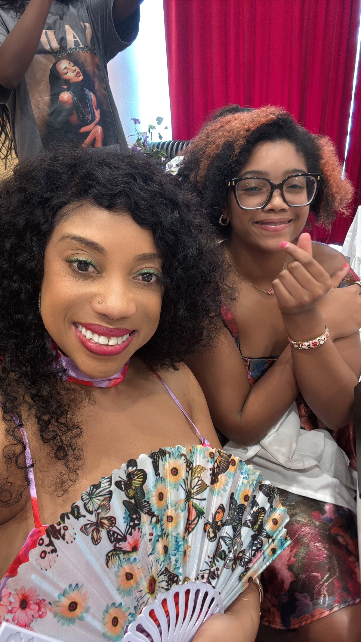Women smiling together at a Tea'sily Graphic Tea Party